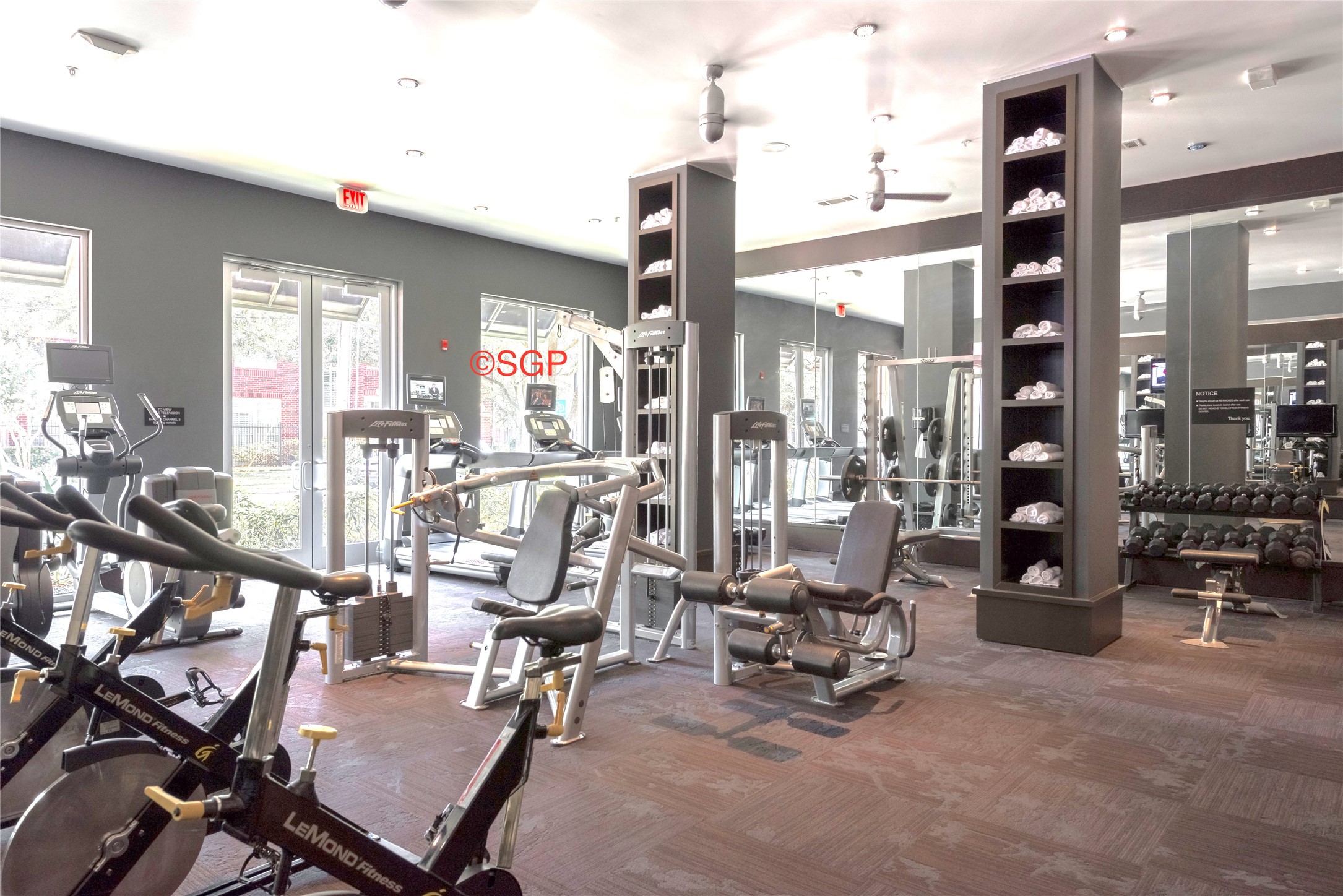 306 McGowen Street, Unit 3206 Houston, TX 77006 - Photo 10 of 19 One of two state-of-the-art fitness centers available for residents to stay active and energized.