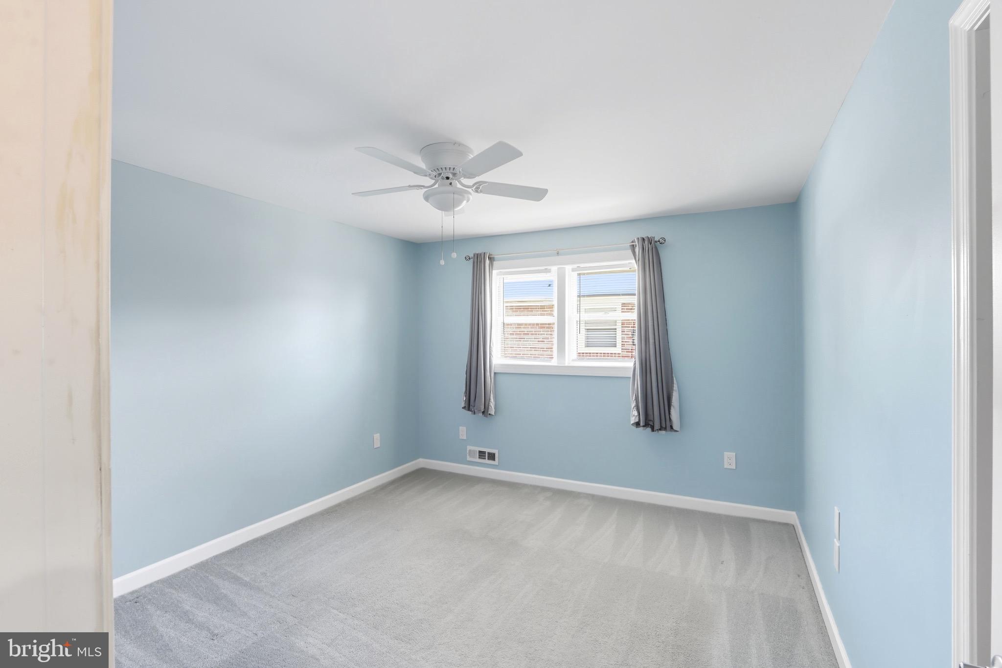 1206 Gettig Road Baltimore, MD 21237 - Photo 13 of 38 an empty room with a window