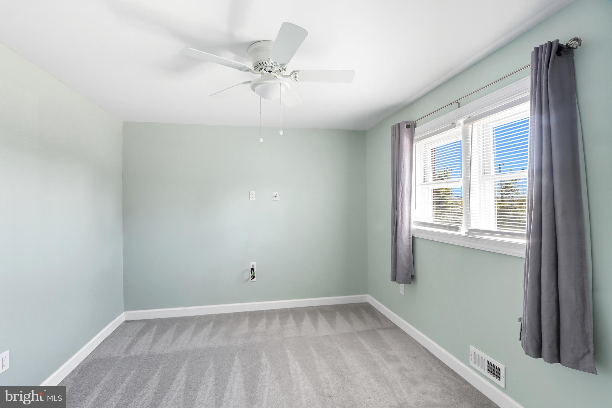 1206 Gettig Road Baltimore, MD 21237 - Photo 17 of 38 an empty room with a window