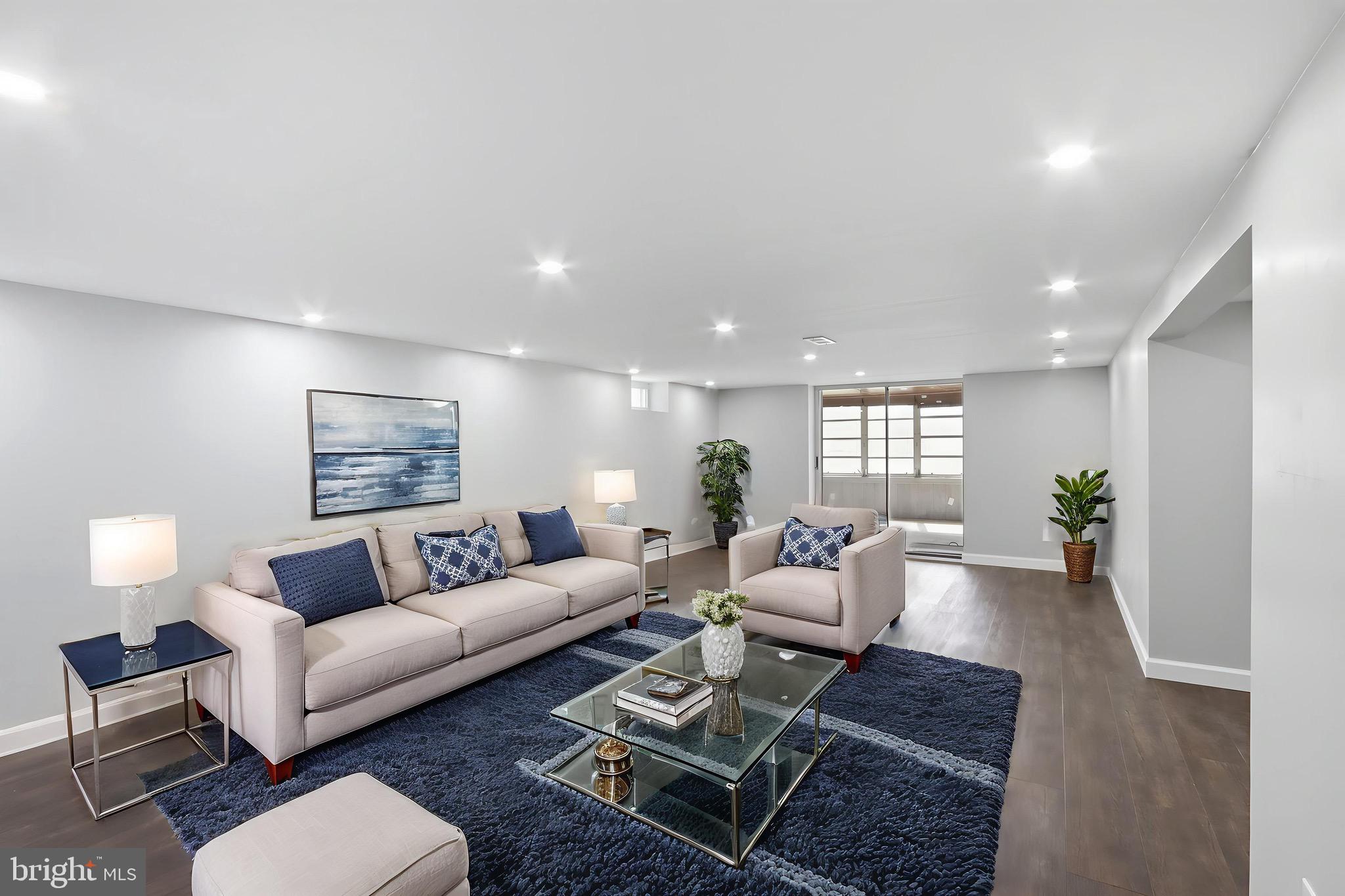 1206 Gettig Road Baltimore, MD 21237 - Photo 32 of 38 a living room with furniture and a wooden floor