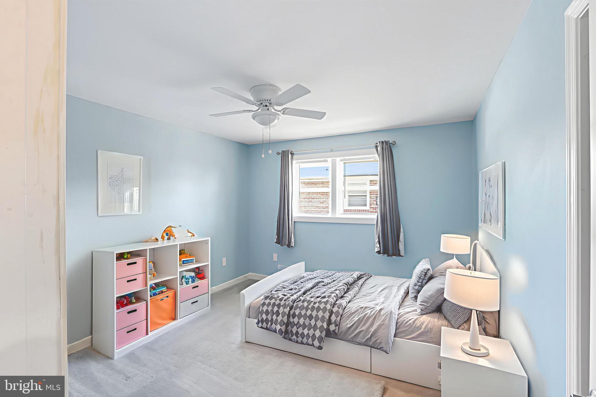 1206 Gettig Road Baltimore, MD 21237 - Photo 34 of 38 a bedroom with a bed and a window