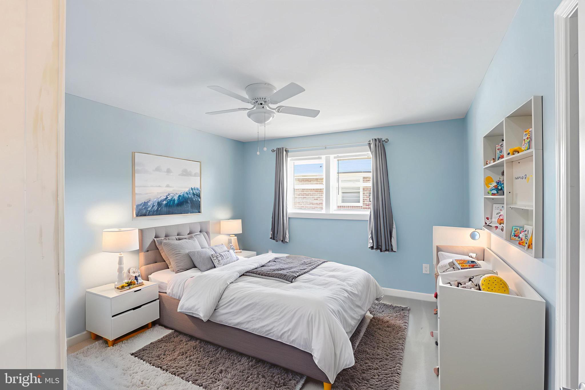 1206 Gettig Road Baltimore, MD 21237 - Photo 35 of 38 a bedroom with a bed and a window