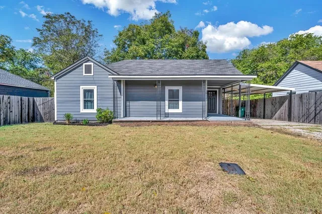 a house view with a garden space
