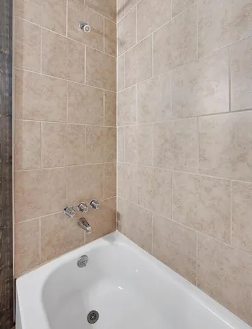 a bathroom with a tub