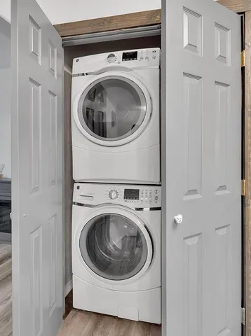 a utility room with dryer and washer
