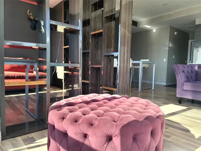 a large pool with table and chairs