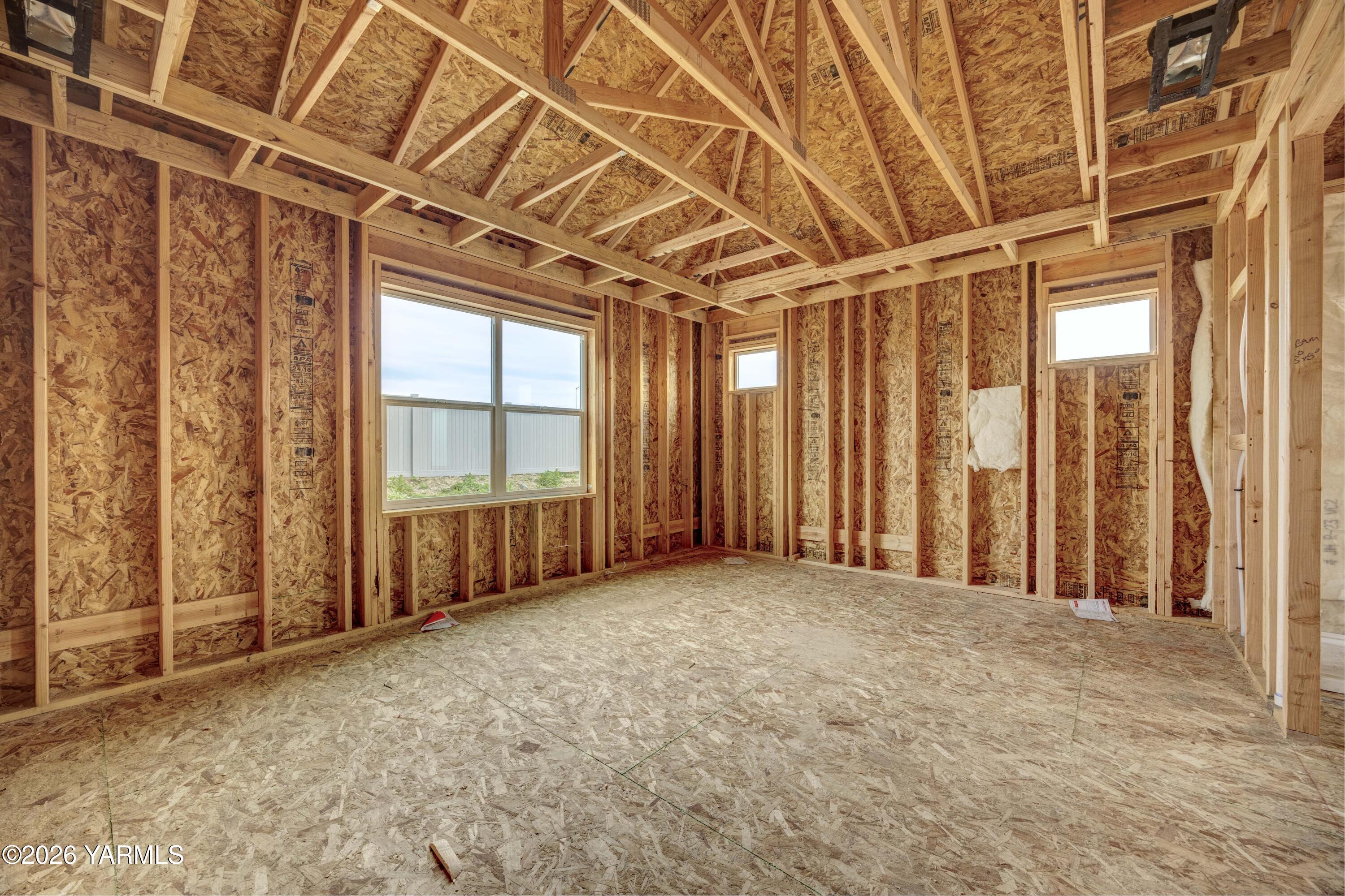 211 Packer Street Prosser, WA 99350 - Photo 12 of 31 an empty room with windows