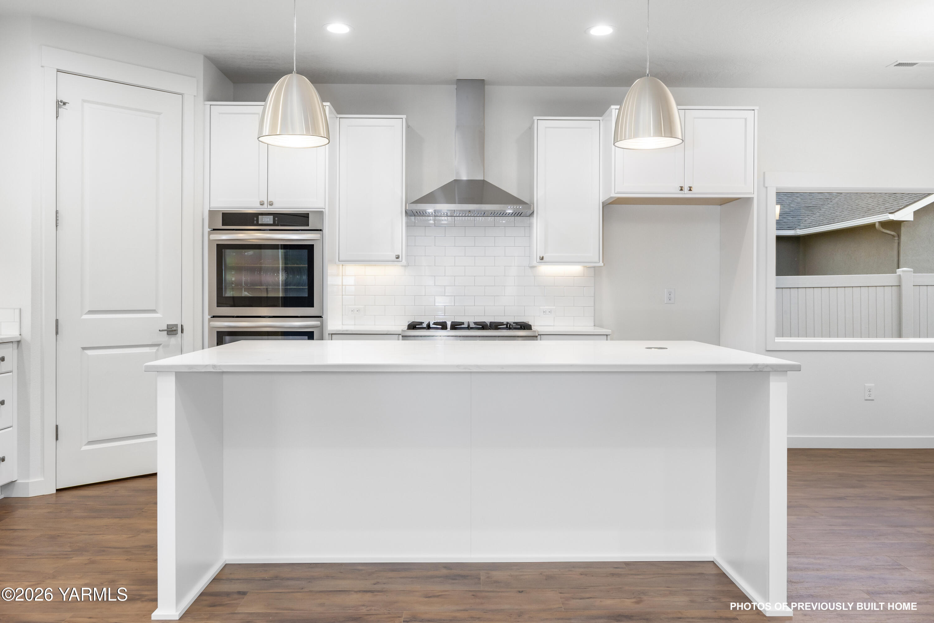 211 Packer Street Prosser, WA 99350 - Photo 22 of 31 a kitchen with stainless steel appliances a sink and a stove