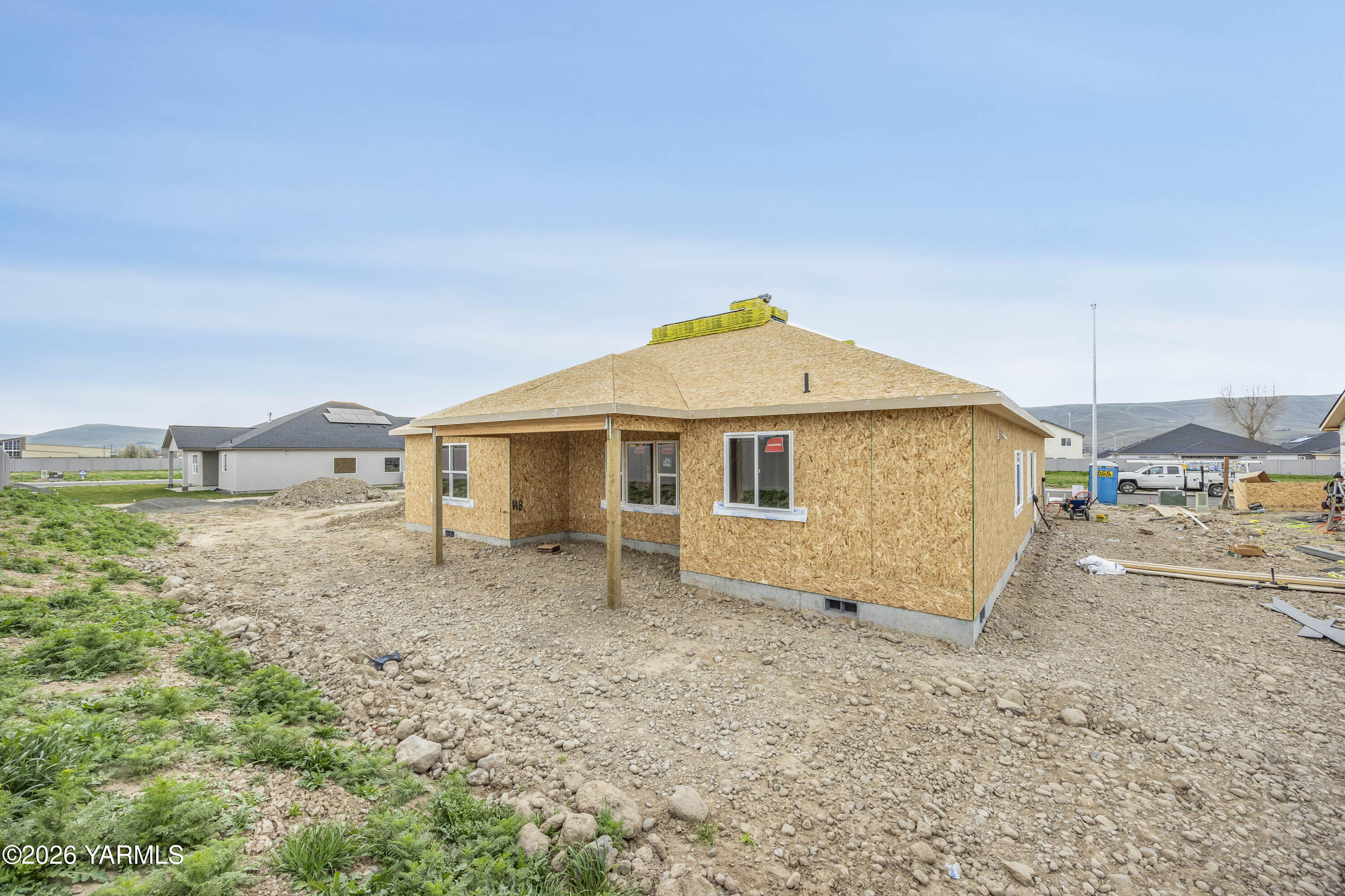 211 Packer Street Prosser, WA 99350 - Photo 30 of 31 a front view of a house with a yard