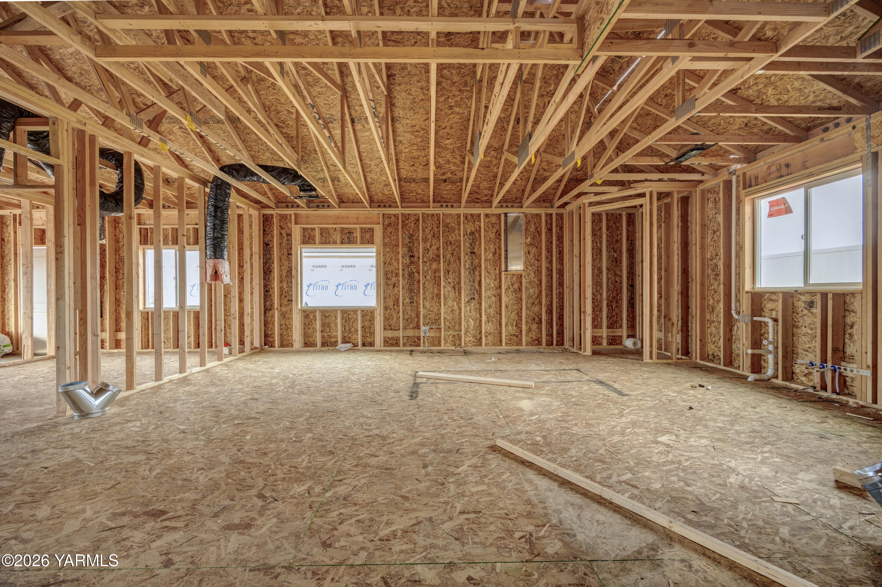 211 Packer Street Prosser, WA 99350 - Photo 5 of 31 a view of a room with large windows