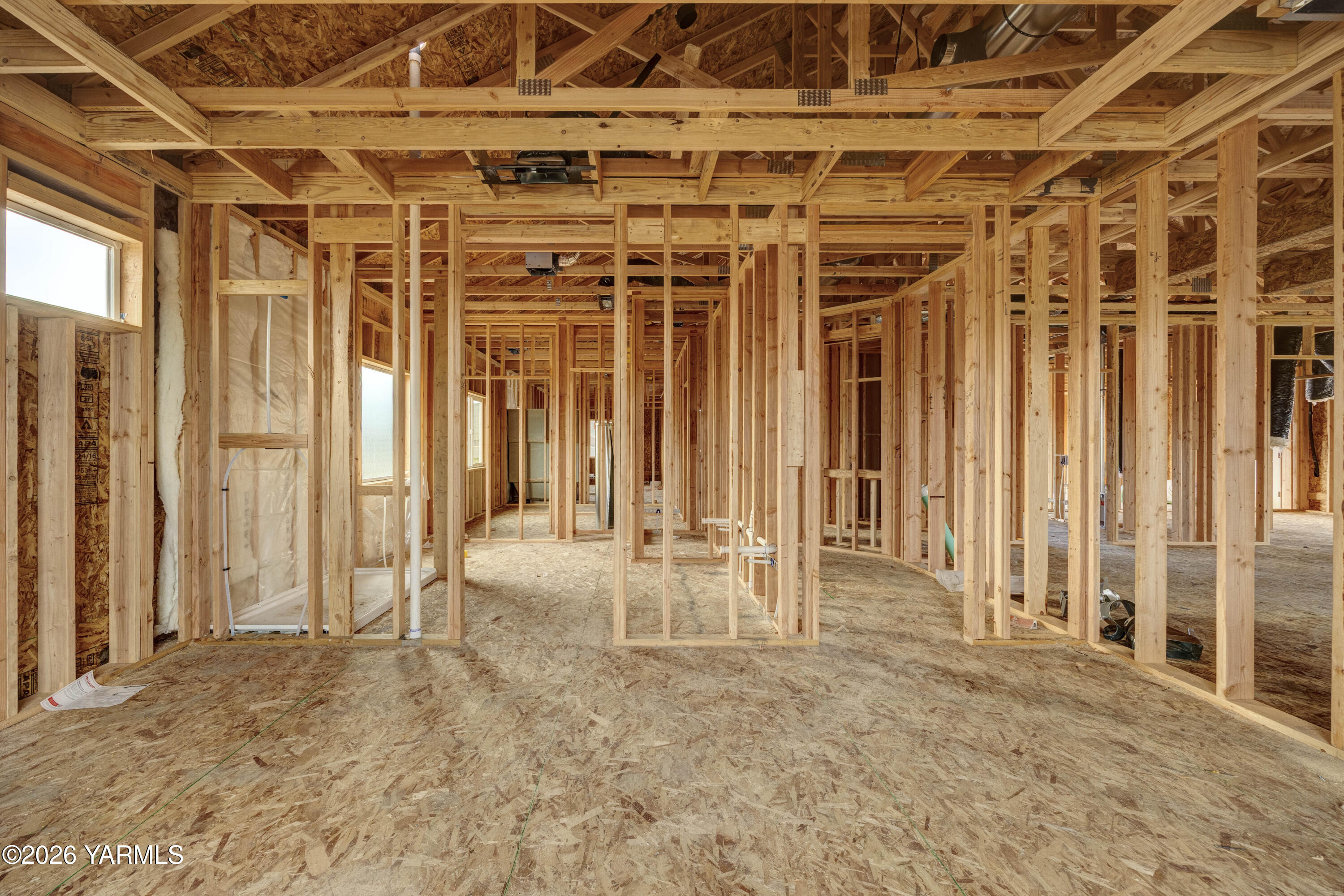 211 Packer Street Prosser, WA 99350 - Photo 7 of 31 a view of a room with wooden walls