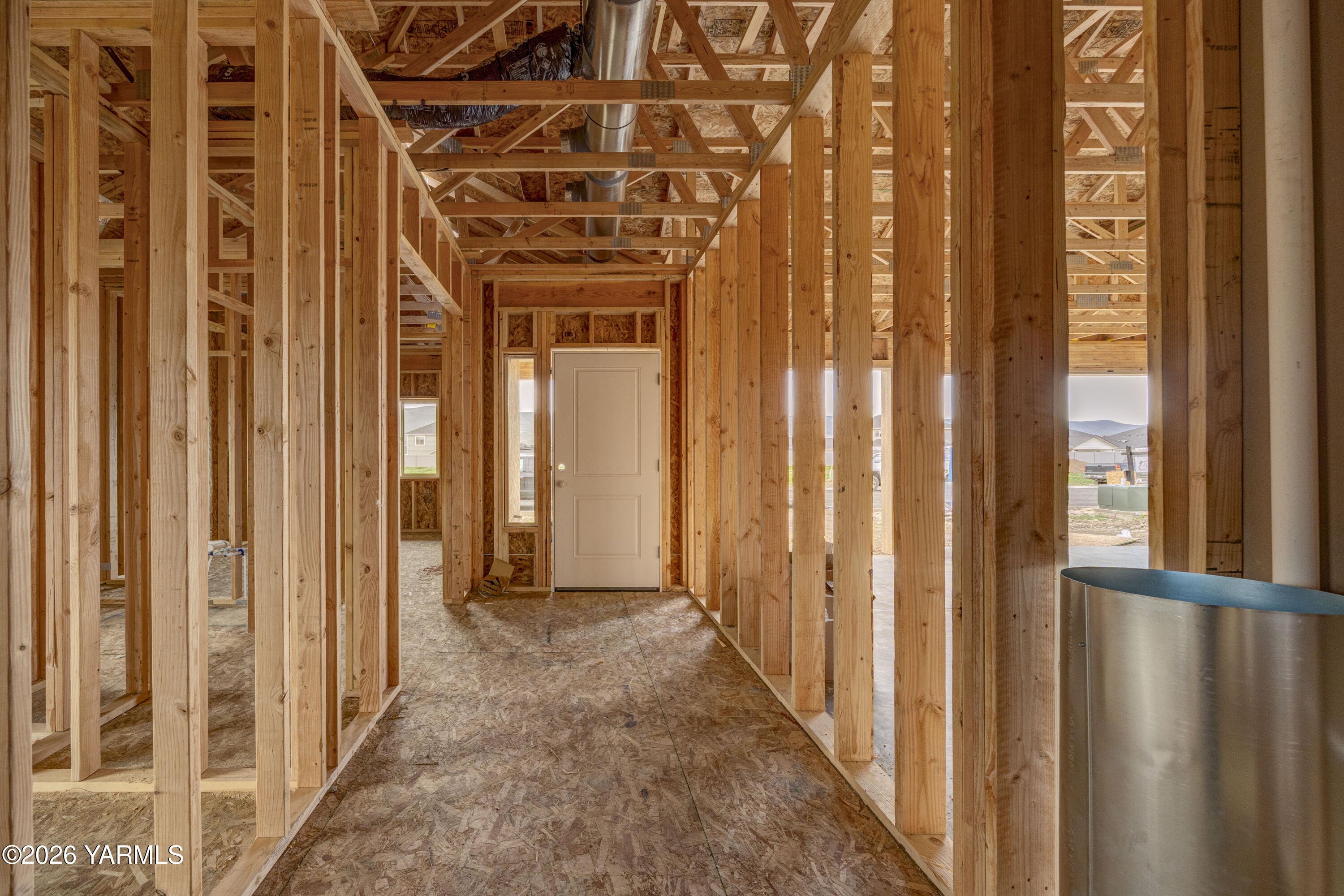 211 Packer Street Prosser, WA 99350 - Photo 8 of 31 a view of a hallway with wooden door