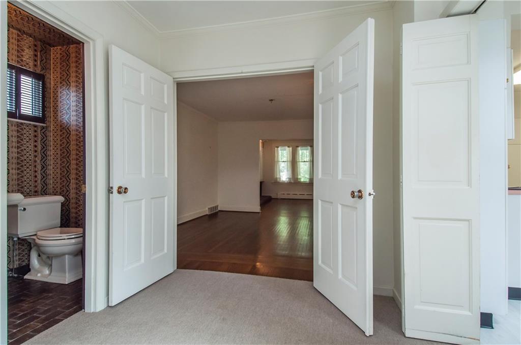 5640 Marlborough Road Pittsburgh, PA 15217 - Photo 7 of 16 View of the layout of the living and dining rooms from the family room.