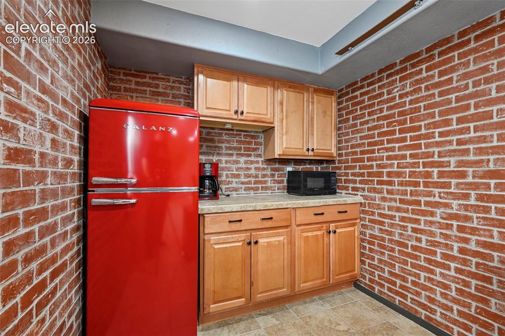 7216 Sylamore Way Peyton, CO 80831 - Photo 16 of 30 All basement kitchen appliances stay.
