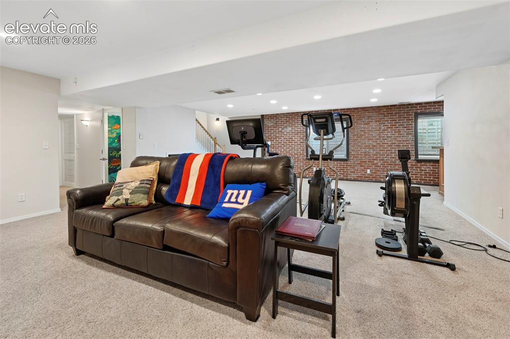 7216 Sylamore Way Peyton, CO 80831 - Photo 17 of 30 Game room, gym, theater room, what ever you want, you have space to create.