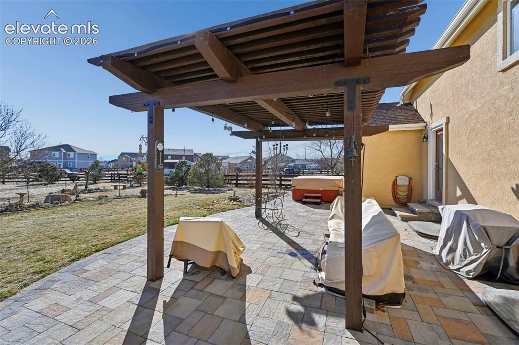 7216 Sylamore Way Peyton, CO 80831 - Photo 23 of 30 Pavers and perg