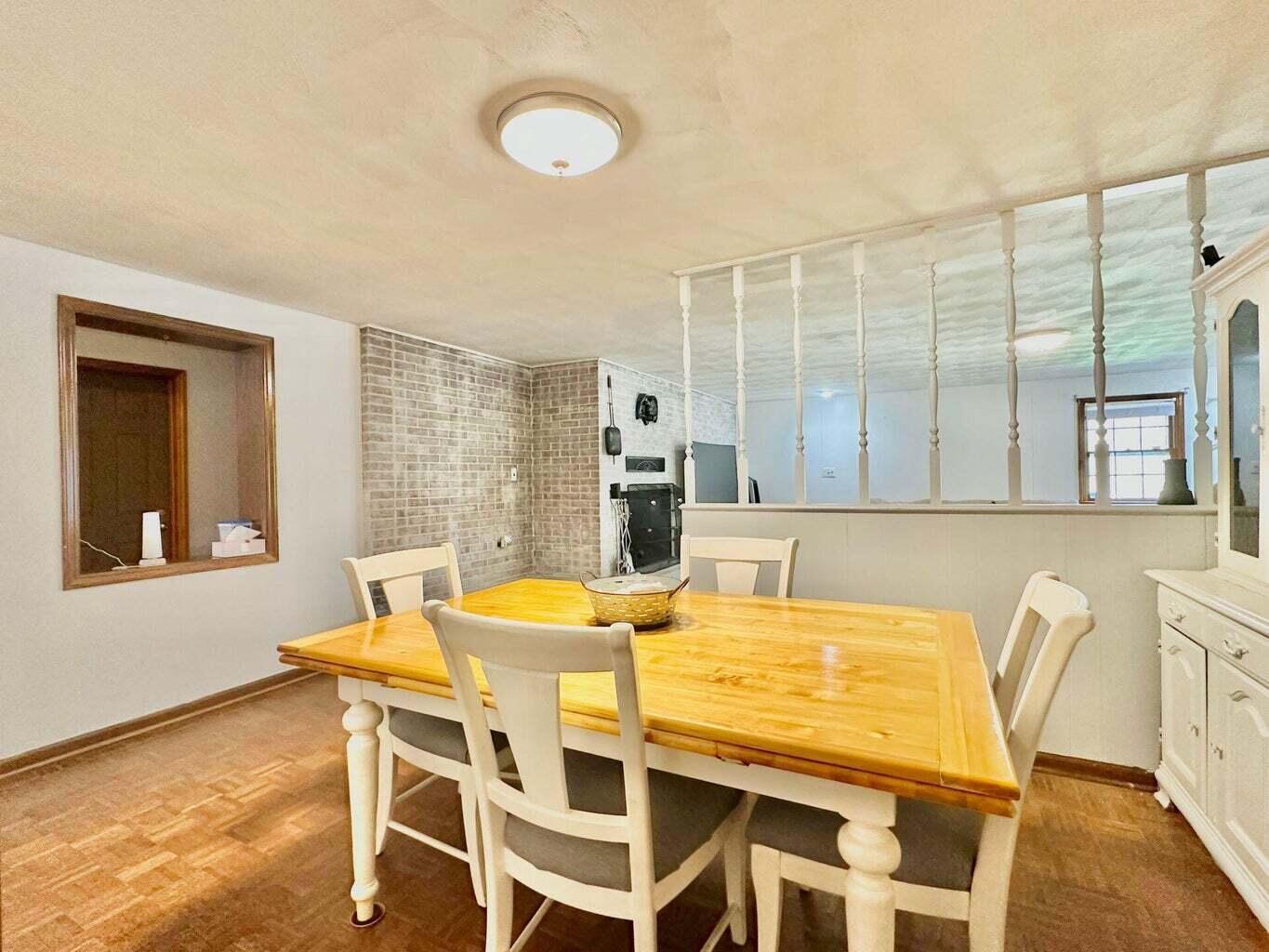 6989 Poage Valley Rd Extension Roanoke, VA 24018 - Photo 11 of 33 a dining room with furniture and window