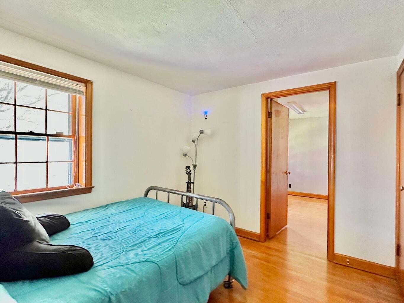 6989 Poage Valley Rd Extension Roanoke, VA 24018 - Photo 15 of 33 a bedroom with a bed and a window