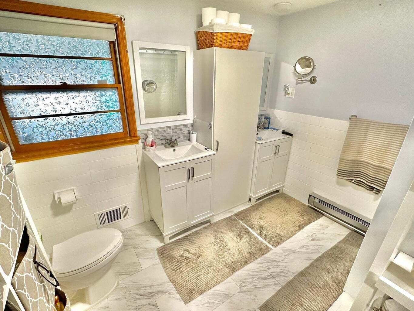 6989 Poage Valley Rd Extension Roanoke, VA 24018 - Photo 19 of 33 a bathroom with a sink toilet and shower