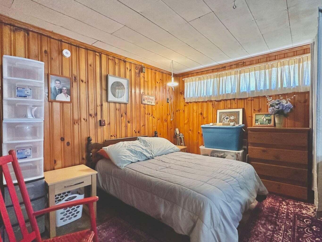 6989 Poage Valley Rd Extension Roanoke, VA 24018 - Photo 21 of 33 a bedroom with a bed and a window