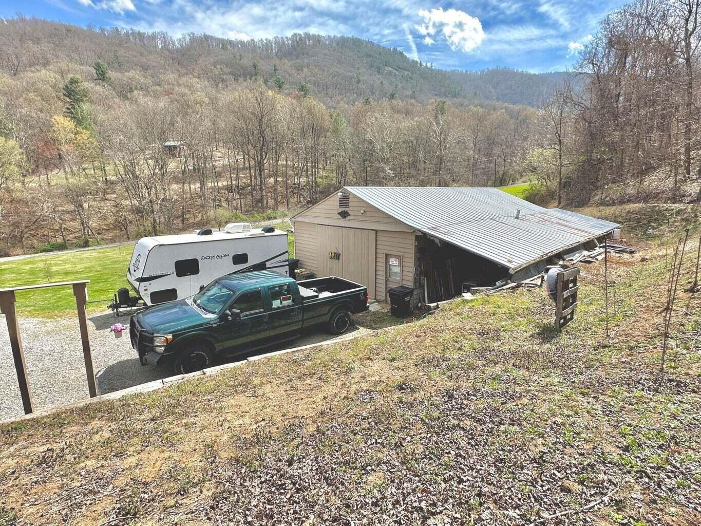 6989 Poage Valley Rd Extension Roanoke, VA 24018 - Photo 25 of 33 a terrace of a house with a yard