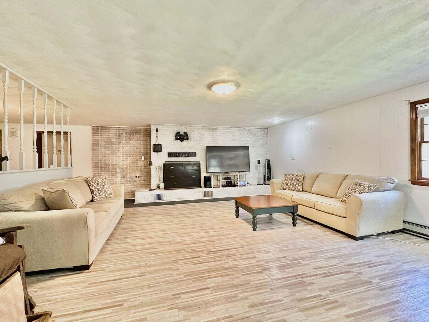 6989 Poage Valley Rd Extension Roanoke, VA 24018 - Photo 8 of 33 a living room with furniture and a couch