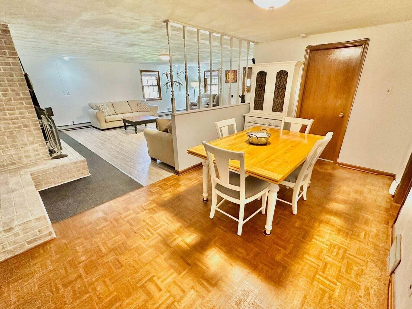 6989 Poage Valley Rd Extension Roanoke, VA 24018 - Photo 10 of 33 a view of a dining room with furniture and a rug