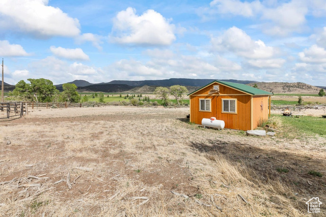 1054 East Jakes Pl Road Fremont, UT 84747 - Photo 12 of 18 View of yard with a mountain view and a rural view