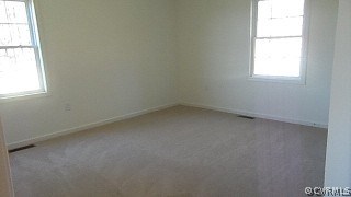 5124 Abilene Road Farmville, VA 23901 - Photo 8 of 10 an empty room with a window