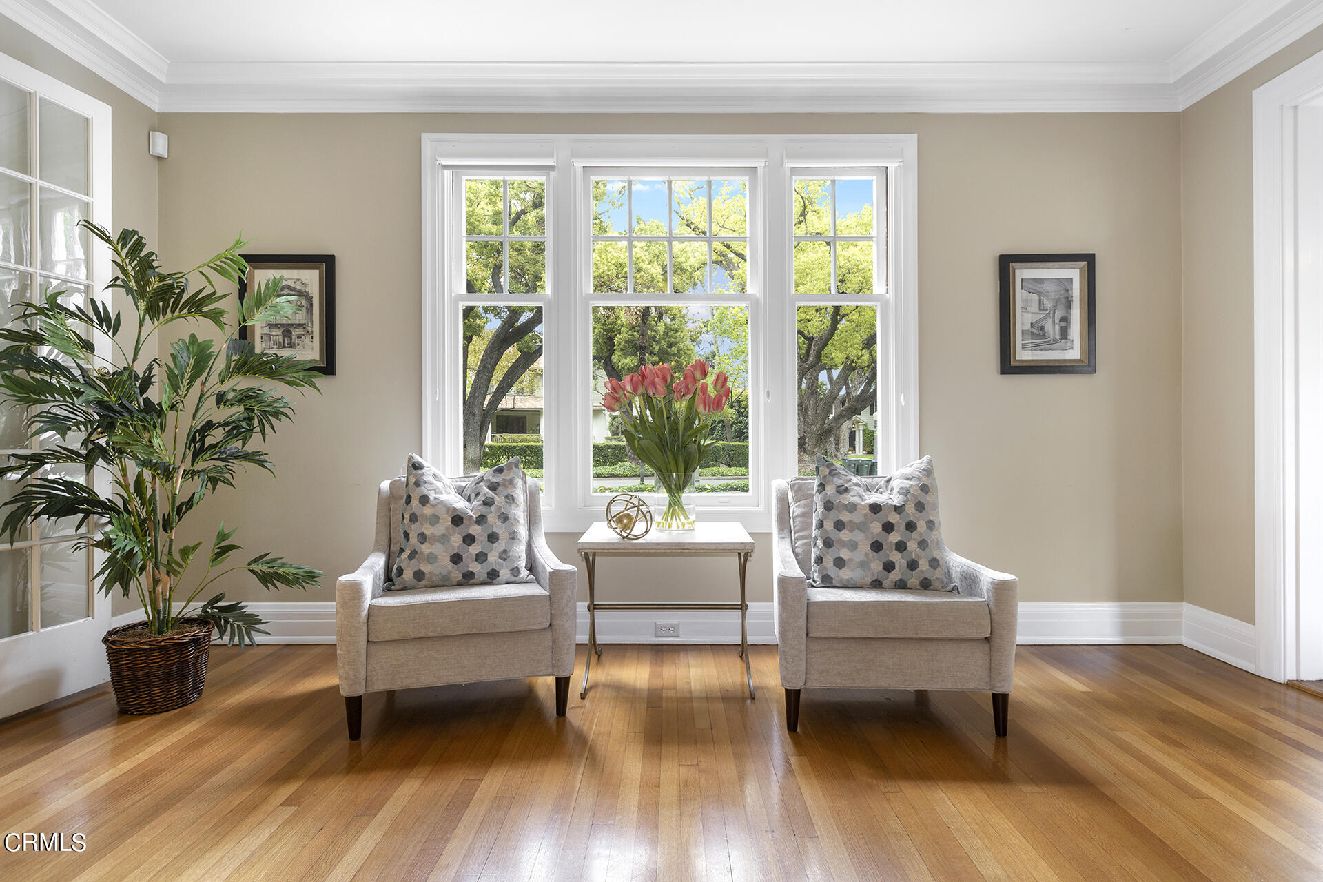 509 Prospect Boulevard Pasadena, CA 91103 - Photo 11 of 68 a living room with furniture and a large window with wooden floor