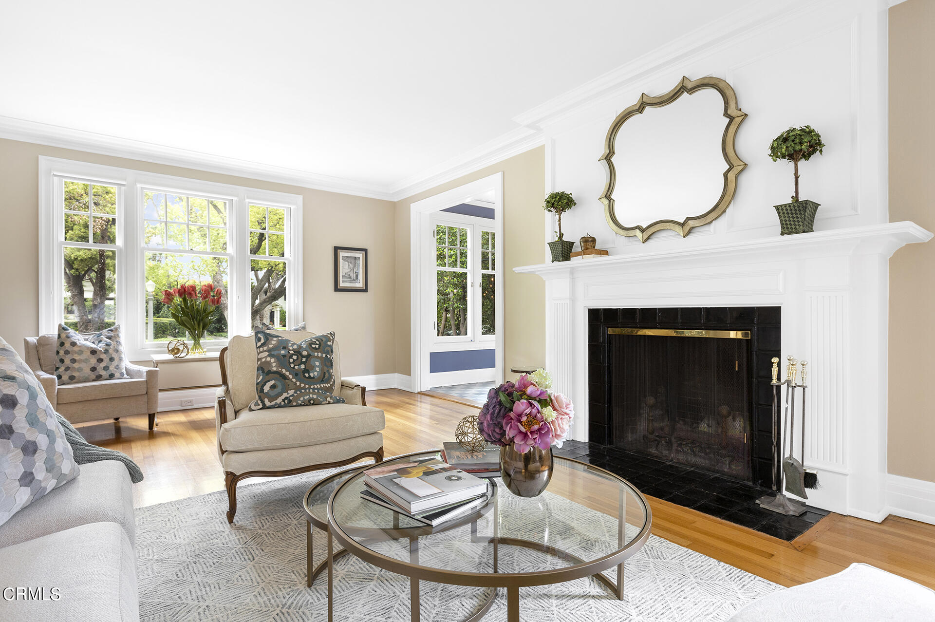 509 Prospect Boulevard Pasadena, CA 91103 - Photo 12 of 68 a living room with furniture a fireplace and a floor to ceiling window
