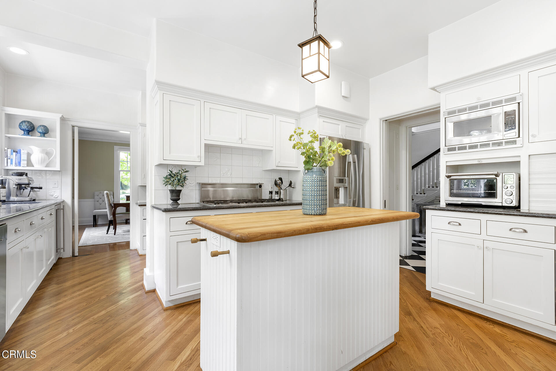 509 Prospect Boulevard Pasadena, CA 91103 - Photo 20 of 68 a kitchen with stainless steel appliances granite countertop a sink stove and refrigerator