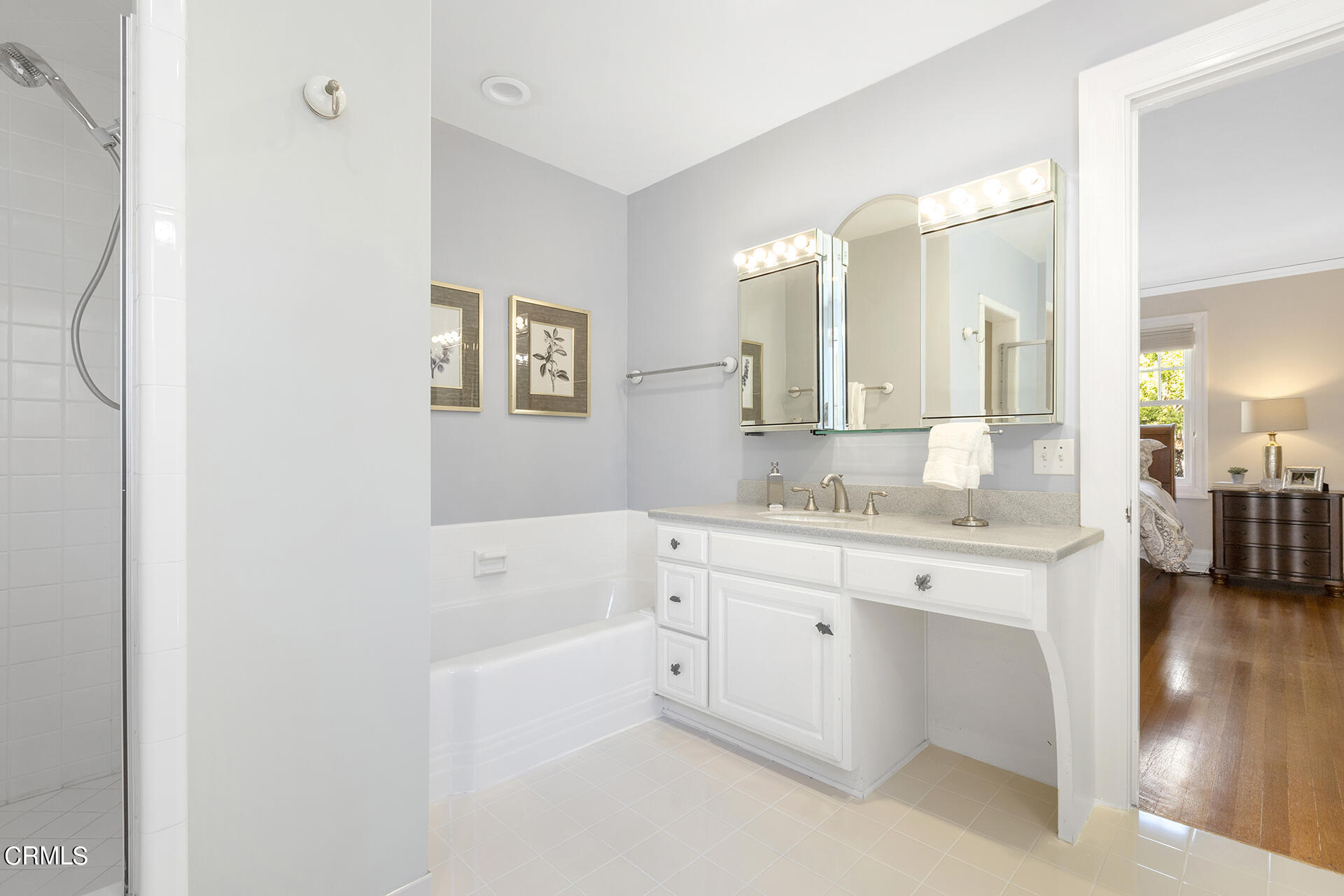 509 Prospect Boulevard Pasadena, CA 91103 - Photo 40 of 68 a bathroom with a granite countertop sink mirror and bathtub