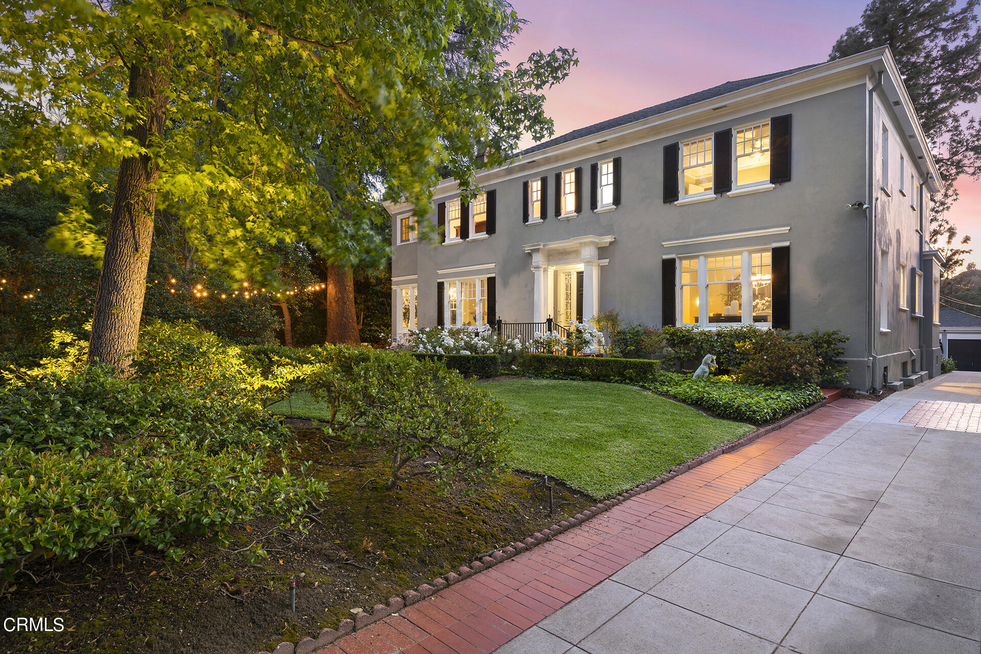 509 Prospect Boulevard Pasadena, CA 91103 - Photo 7 of 68 a front view of a house with a yard and potted plants