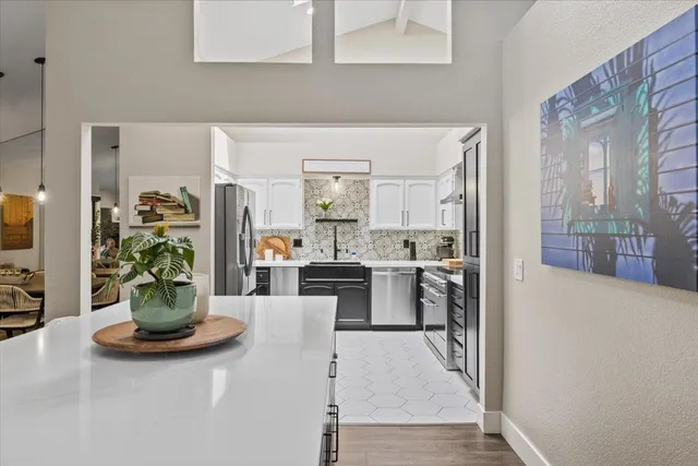 a view of a kitchen and living room