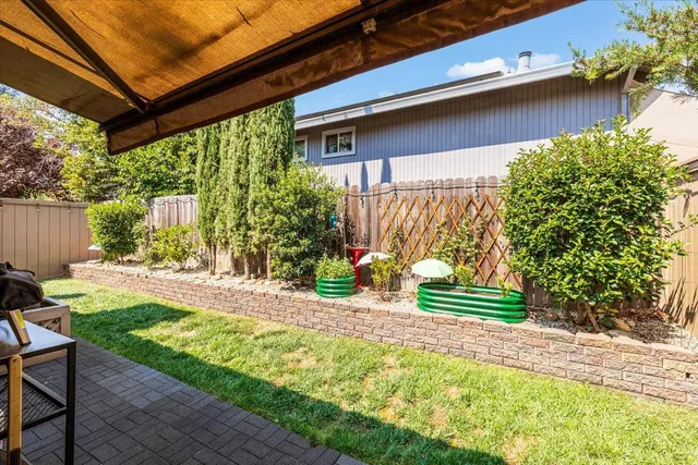 a house view with a garden space