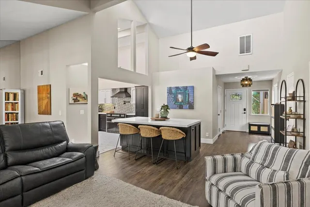 a view of a livingroom with furniture and a table