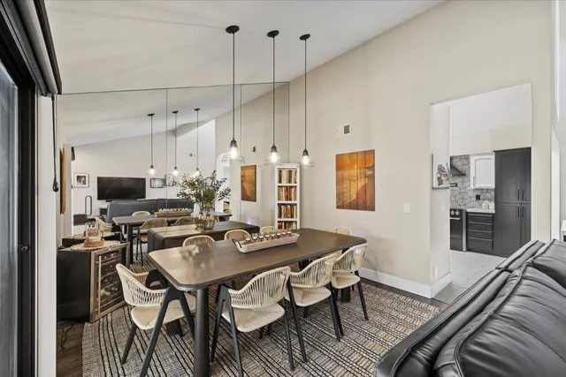 a view of a dining room with furniture