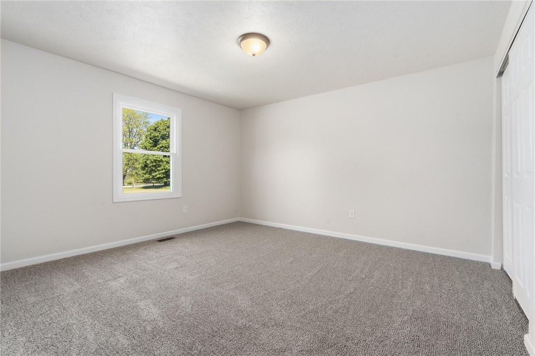 1353 Foust Road Xenia, OH 45385 - Photo 41 of 50 This bright and airy room offers a tranquil view of nature.