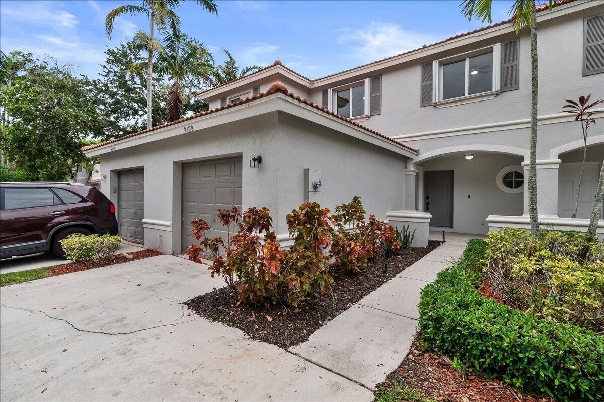 8128 Big Pine Way Riviera Beach, FL 33407 - Photo 2 of 37 Walkway Front