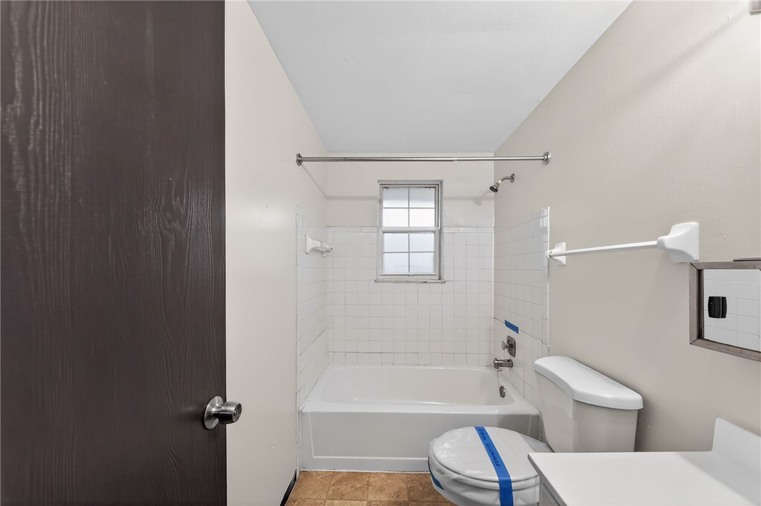 6070 Charlesgate Road Huber Heights, OH 45424 - Photo 24 of 29 This clean and functional bathroom offers a simple and inviting space for daily routines.