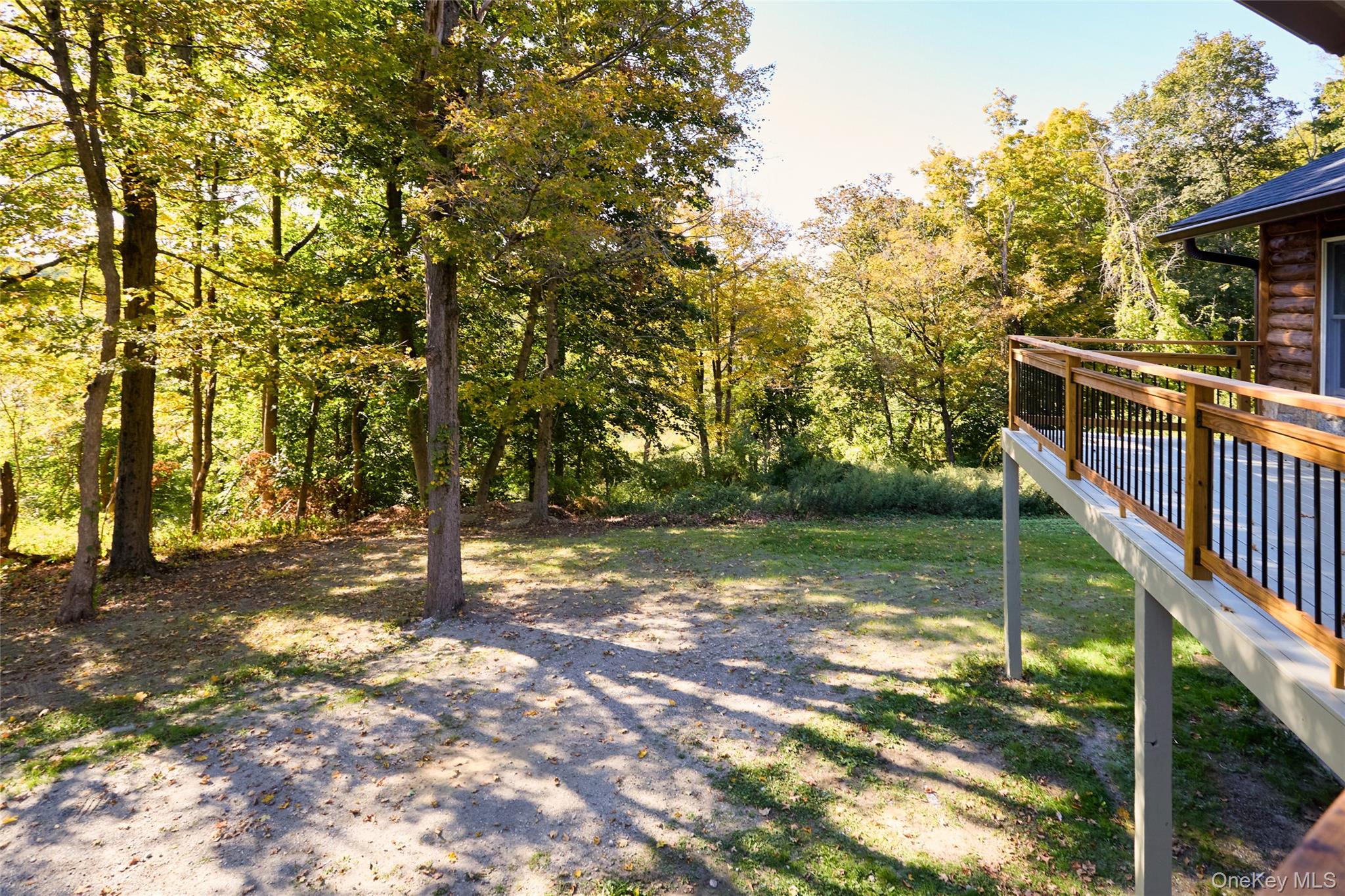 568 Oak Summit Road Millbrook, NY 12545 - Photo 45 of 50 View of yard with a wooden deck