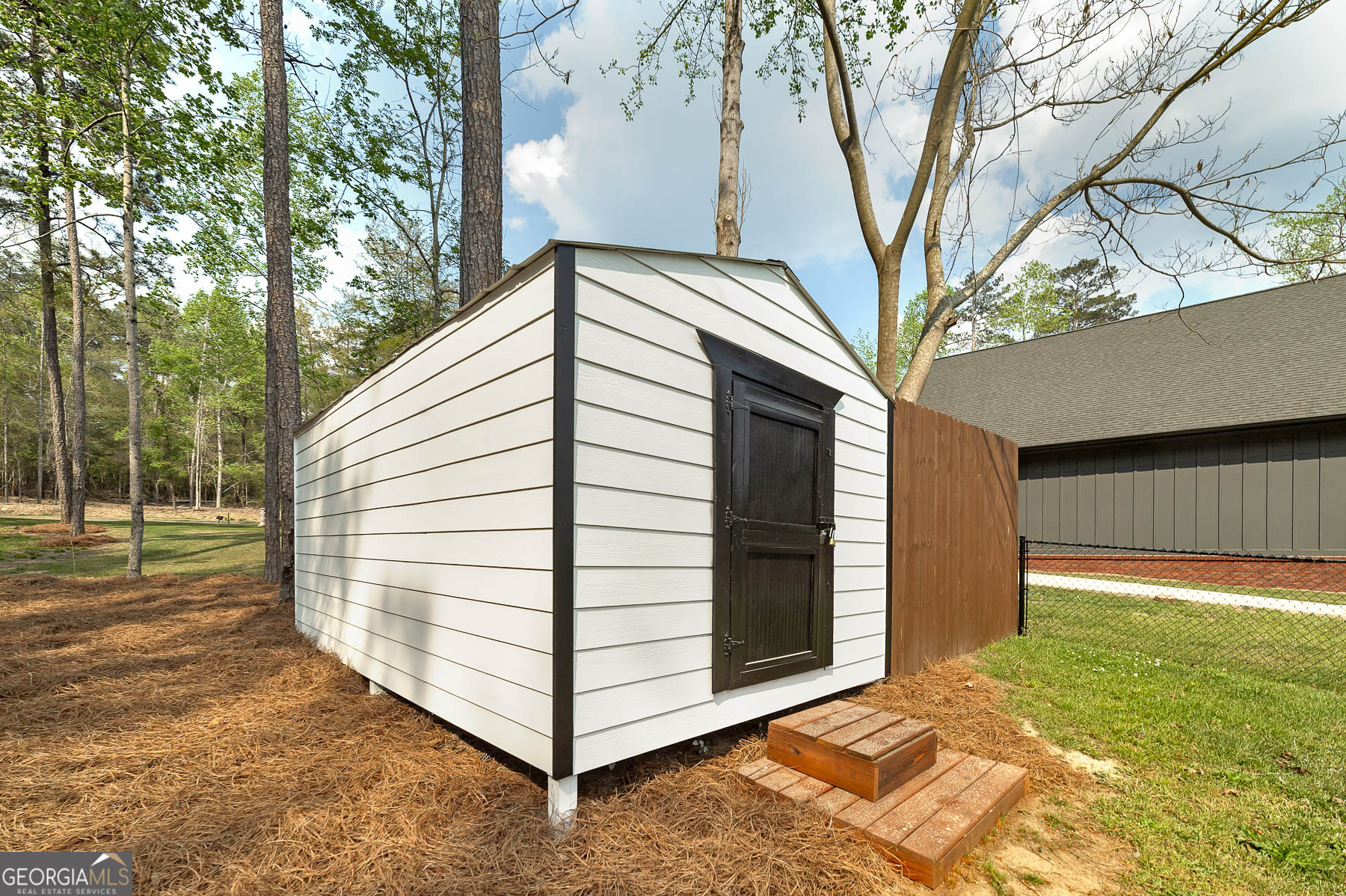 595 Barnetts Bridge Road Jackson, GA 30233 - Photo 43 of 47 a view of a house with a yard