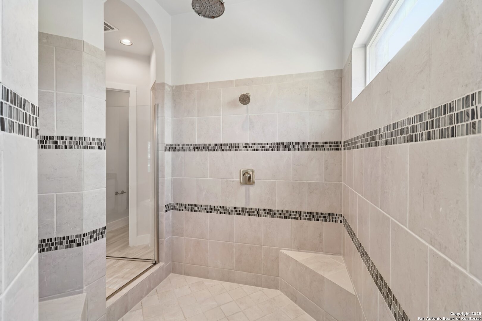 31040 Clover Pass Bulverde, TX 78163 - Photo 16 of 43 a bathroom with a bathtub and a shower