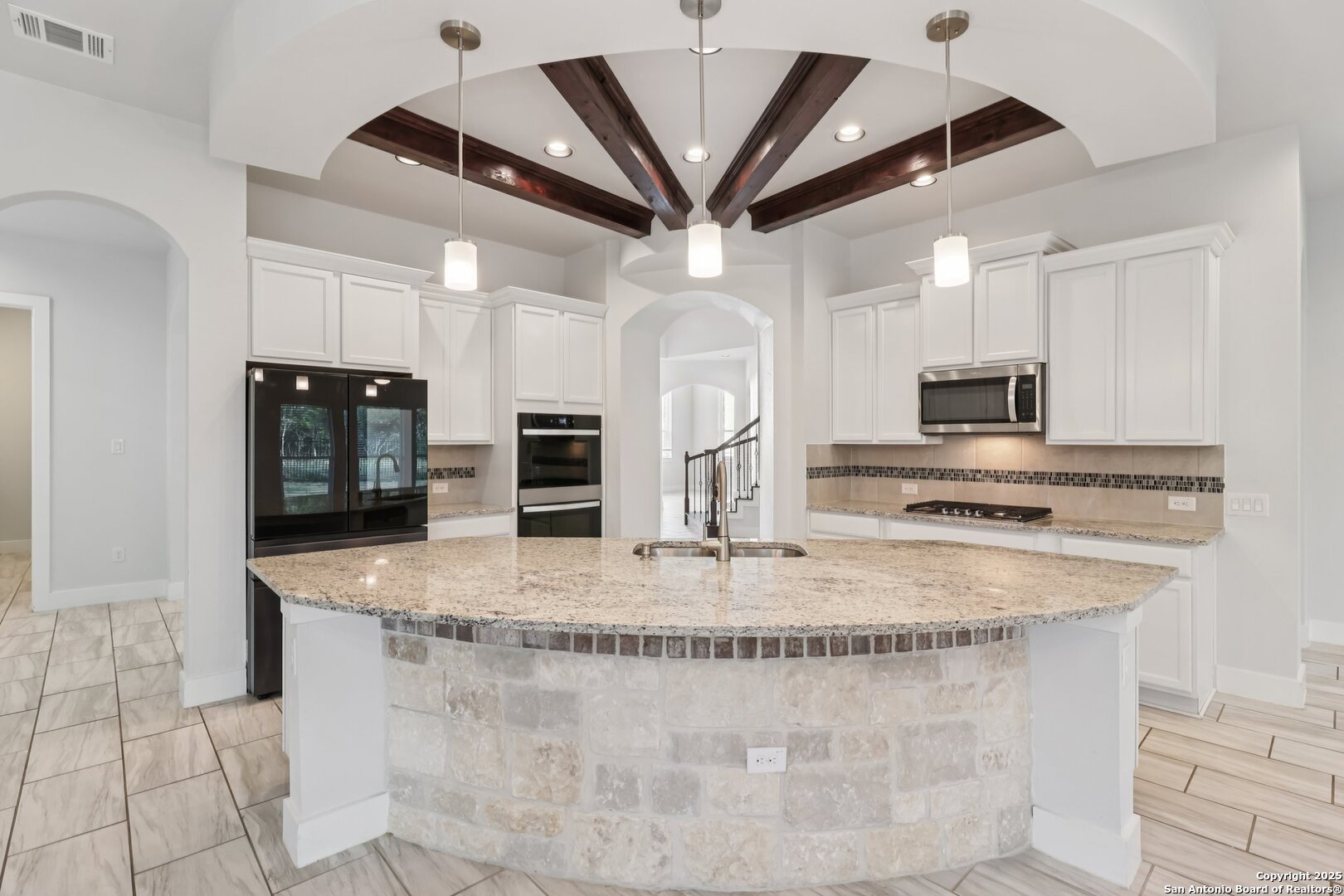 31040 Clover Pass Bulverde, TX 78163 - Photo 2 of 43 a kitchen with stainless steel appliances granite countertop a sink a stove and a refrigerator