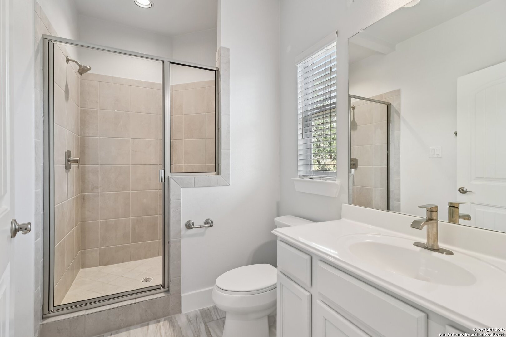 31040 Clover Pass Bulverde, TX 78163 - Photo 23 of 43 a bathroom with a sink toilet and shower