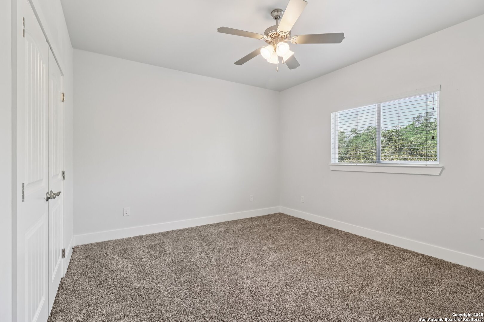 31040 Clover Pass Bulverde, TX 78163 - Photo 26 of 43 wooden floor in an empty room with a window