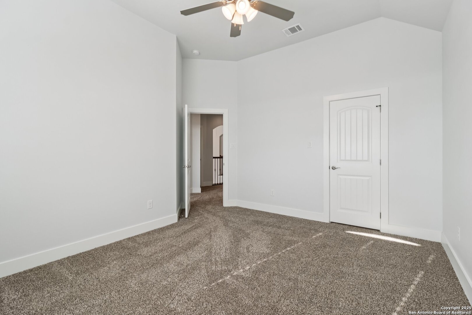 31040 Clover Pass Bulverde, TX 78163 - Photo 33 of 43 an empty room with a ceiling fan and a window