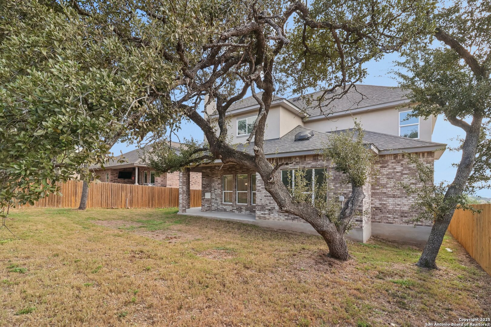 31040 Clover Pass Bulverde, TX 78163 - Photo 42 of 43 a view of a house with a yard