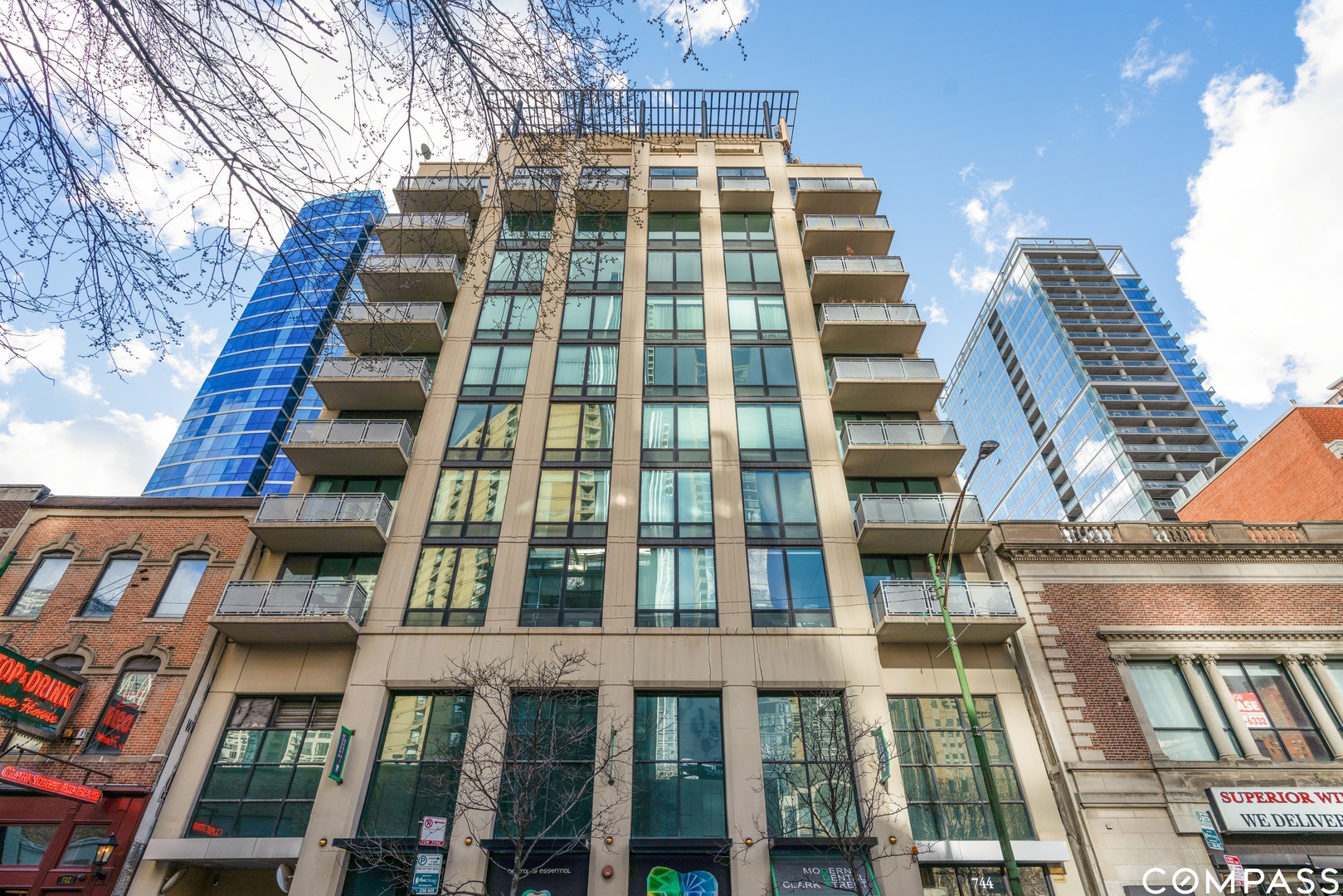 744 North Clark Street, Unit 704 Chicago, IL 60654 - Photo 1 of 12 a front view of a multi story residential apartment building